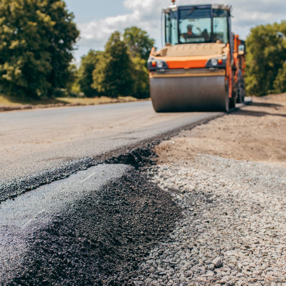 vibratory-asphalt-rollers-compactor-compacting-new-asphalt-pavement-road-service-build-new-highwa